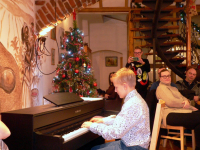 Vánoční klavírní koncert v Jacques Café 2022